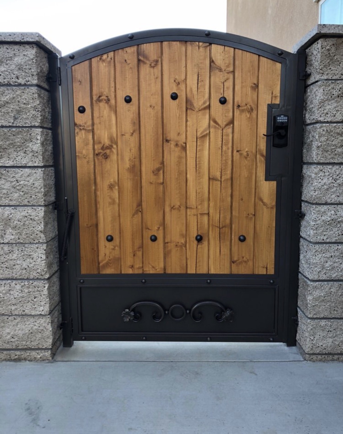 Wood and iron side gate with keypad lock