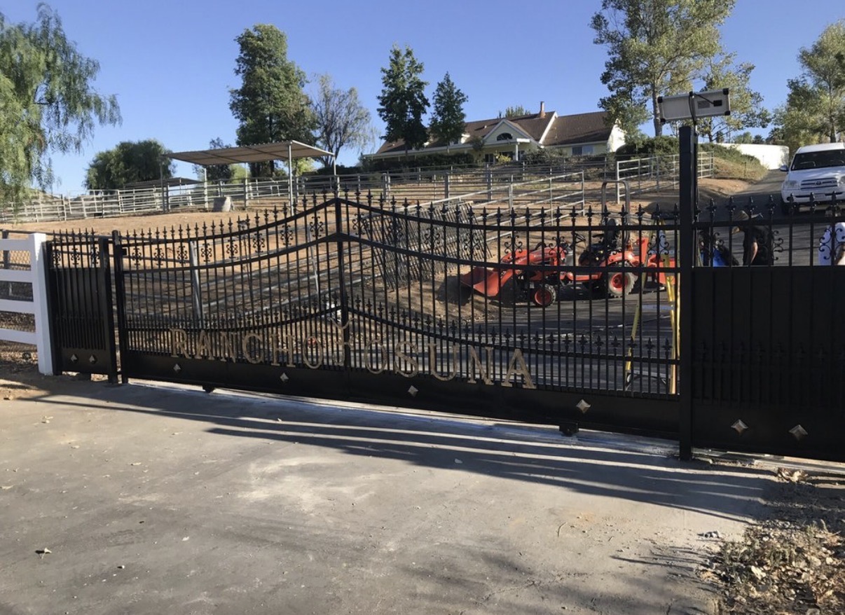 Rancho Osuna estate iron driveway gate