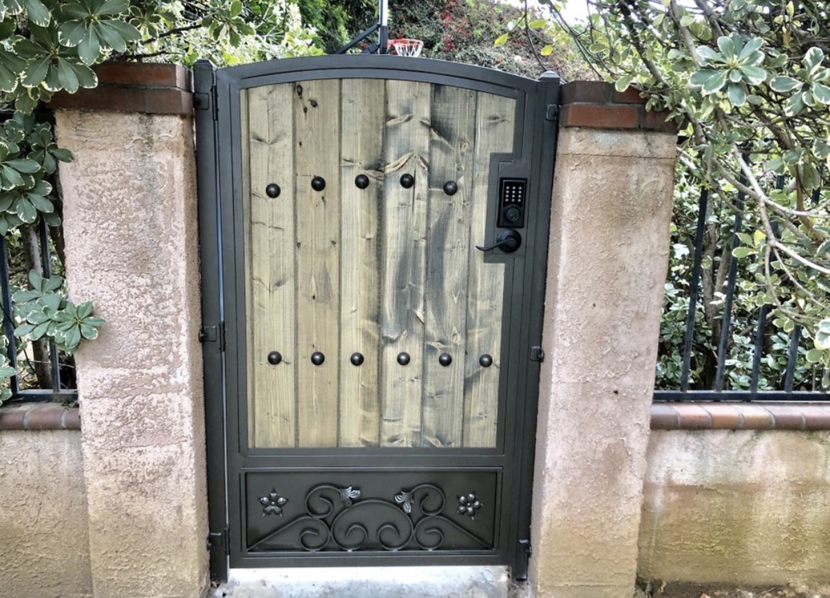 Rustic wood and iron side gate with keypad