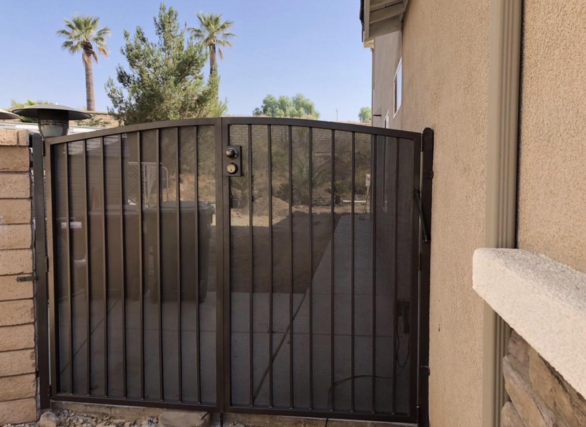 Bronze iron arched double security gate with mesh