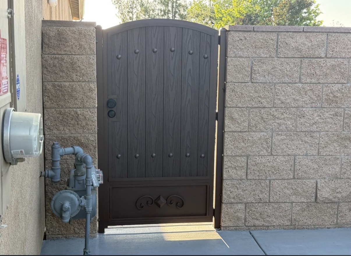Wood-grain iron side gate with keypad and diamond accent