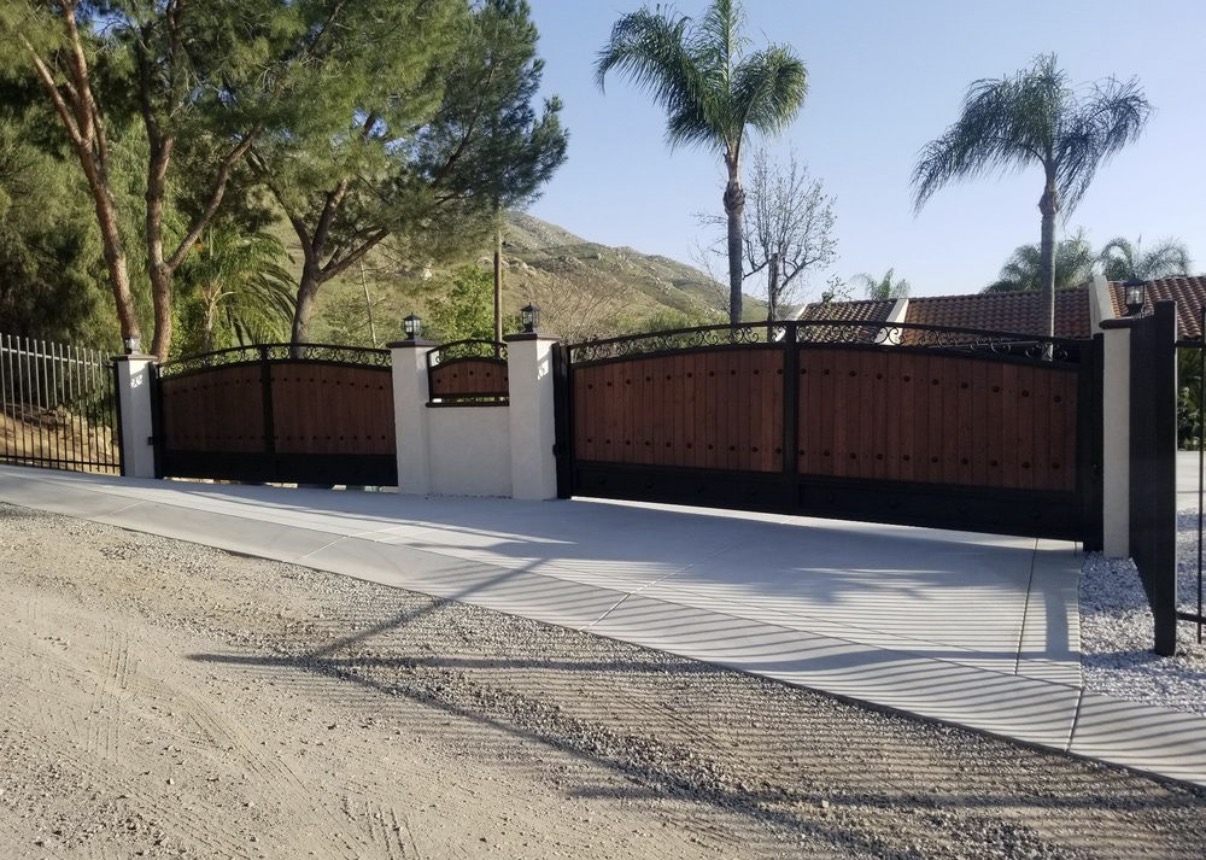 Wood and iron driveway gates in the hills