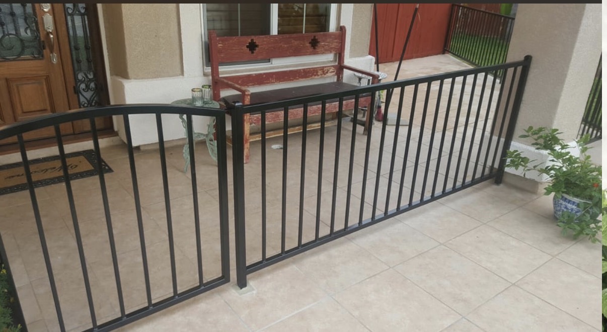 Iron porch railing with arched detail